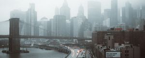 Preview wallpaper road, buildings, aerial view, city, fog