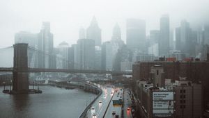 Preview wallpaper road, buildings, aerial view, city, fog