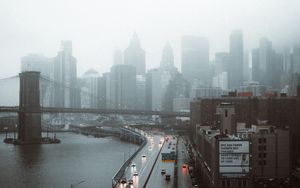 Preview wallpaper road, buildings, aerial view, city, fog