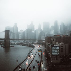 Preview wallpaper road, buildings, aerial view, city, fog