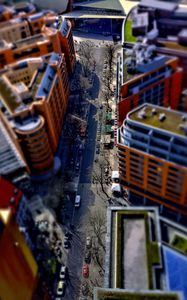 Preview wallpaper road, buildings, cars, street, height, aerial view