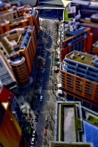 Preview wallpaper road, buildings, cars, street, height, aerial view