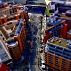 Preview wallpaper road, buildings, cars, street, height, aerial view