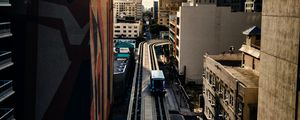 Preview wallpaper road, buildings, facades, car, palm trees