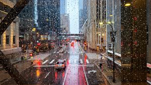 Preview wallpaper road, buildings, window, drops, rain, city