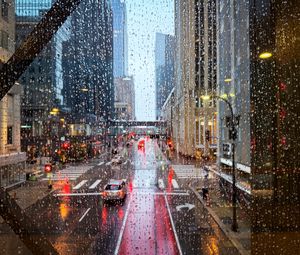 Preview wallpaper road, buildings, window, drops, rain, city