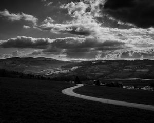 Preview wallpaper road, bw, turn, sky, clouds