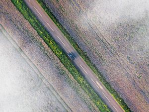 Preview wallpaper road, car, aerial view, fields, clouds