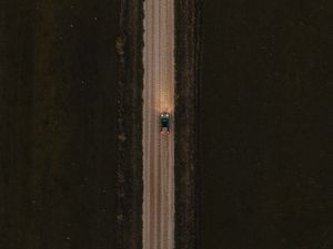 Preview wallpaper road, car, aerial view, grass, evening