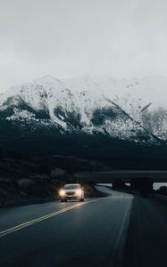 Preview wallpaper road, car, mountain, snowy, nature