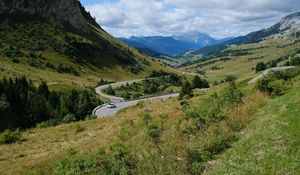 Preview wallpaper road, car, mountains, hills, grass, trees, nature