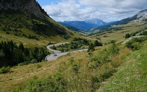 Preview wallpaper road, car, mountains, hills, grass, trees, nature