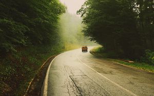 Preview wallpaper road, car, travel, forest, fog, nature