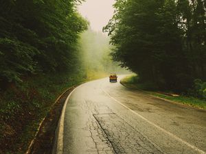 Preview wallpaper road, car, travel, forest, fog, nature