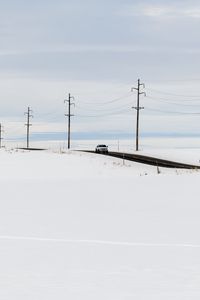 Preview wallpaper road, car, winter, minimalism, snow, movement