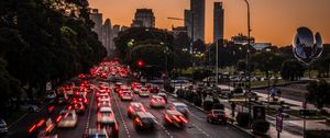 Preview wallpaper road, cars, buildings, city, evening