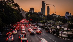 Preview wallpaper road, cars, buildings, city, evening