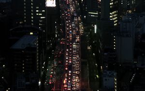 Preview wallpaper road, cars, buildings, street, city, aerial view, dark