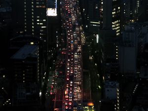 Preview wallpaper road, cars, buildings, street, city, aerial view, dark