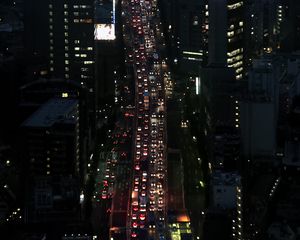 Preview wallpaper road, cars, buildings, street, city, aerial view, dark