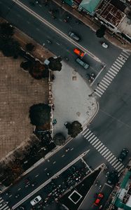 Preview wallpaper road, cars, buildings, aerial view