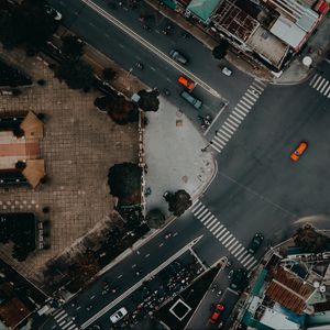 Preview wallpaper road, cars, buildings, aerial view