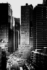 Preview wallpaper road, cars, buildings, skyscrapers, city, black and white