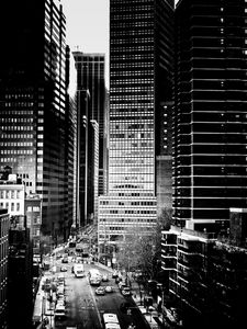 Preview wallpaper road, cars, buildings, skyscrapers, city, black and white