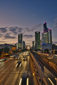 Preview wallpaper road, cars, buildings, evening, lights