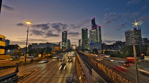 Preview wallpaper road, cars, buildings, evening, lights