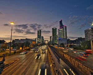Preview wallpaper road, cars, buildings, evening, lights