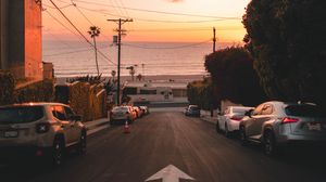 Preview wallpaper road, cars, coast, pointer