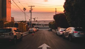 Preview wallpaper road, cars, coast, pointer