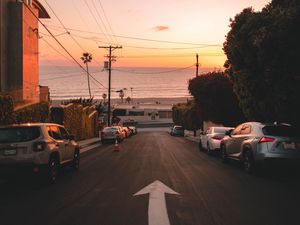 Preview wallpaper road, cars, coast, pointer