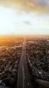 Preview wallpaper road, cars, houses, trees, aerial view