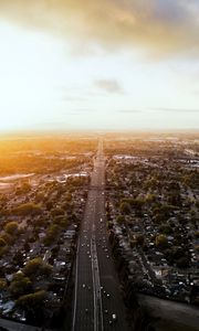 Preview wallpaper road, cars, houses, trees, aerial view