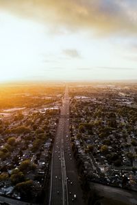 Preview wallpaper road, cars, houses, trees, aerial view