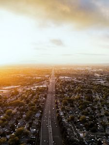 Preview wallpaper road, cars, houses, trees, aerial view