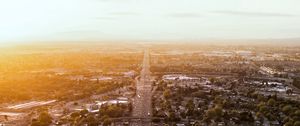 Preview wallpaper road, cars, houses, trees, aerial view