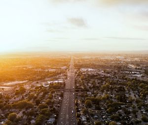 Preview wallpaper road, cars, houses, trees, aerial view