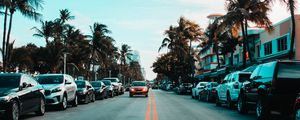 Preview wallpaper road, cars, markings, palm trees, sky