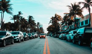 Preview wallpaper road, cars, markings, palm trees, sky
