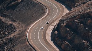 Preview wallpaper road, cars, mountain, slope, aerial view