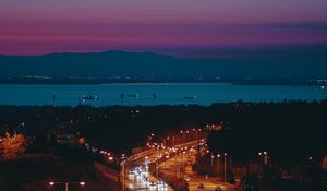 Preview wallpaper road, cars, night, lights, winding