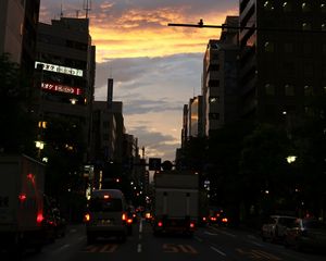 Preview wallpaper road, cars, street, lights, evening