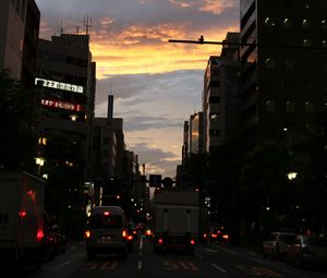 Preview wallpaper road, cars, street, lights, evening