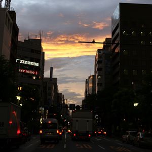 Preview wallpaper road, cars, street, lights, evening