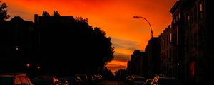 Preview wallpaper road, cars, street, sunset, distance