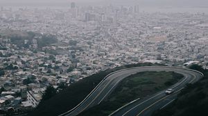 Preview wallpaper road, city, aerial view, fog, buildings, car
