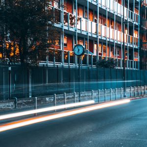 Preview wallpaper road, clock, building, long exposure, glow